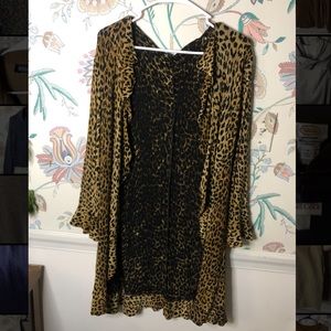 Beautiful Cheetah print cardigan. No tags but fits a medium.